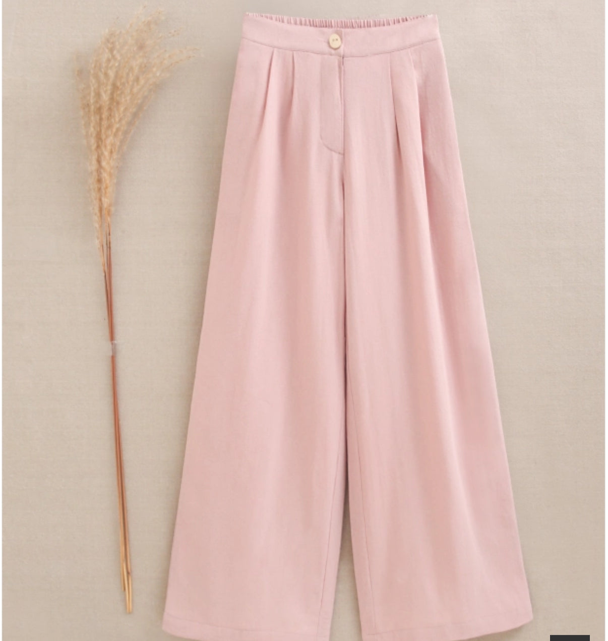 PANTALÓN DE NIÑA ROSA FLUIDO CON TEXTURA