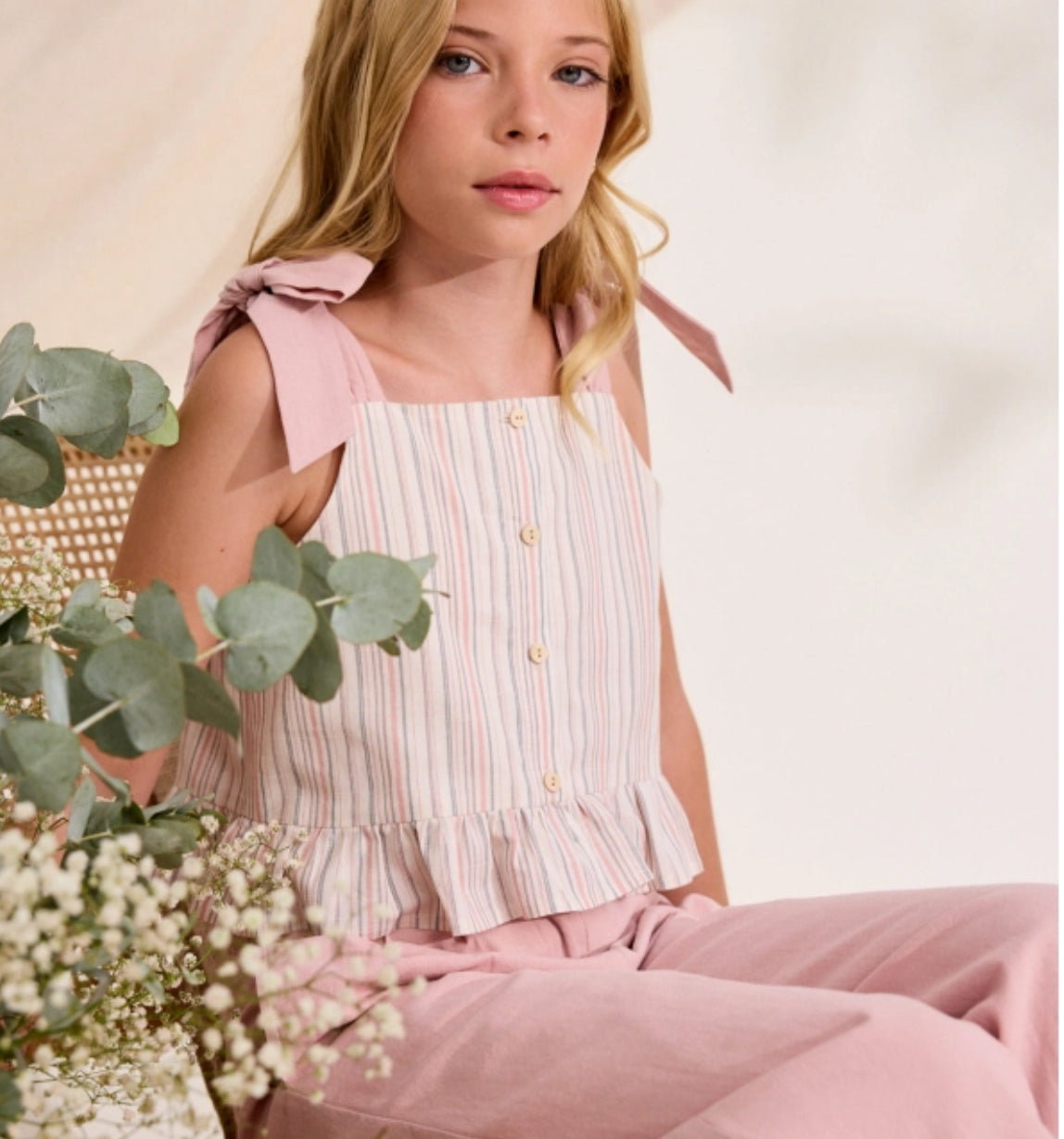 PANTALÓN DE NIÑA ROSA FLUIDO CON TEXTURA