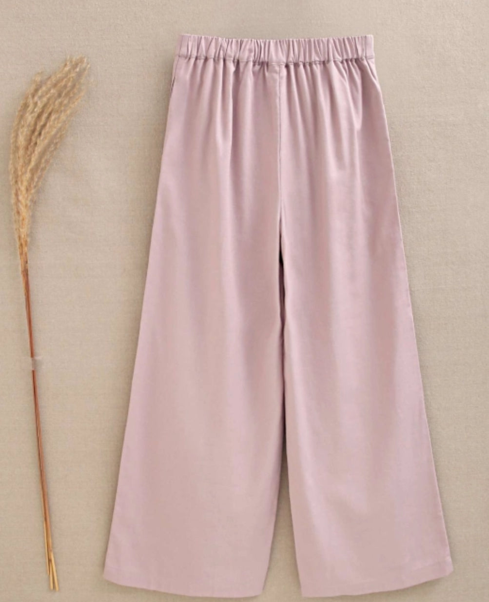 PANTALÓN DE NIÑA MALVA FLUIDO CON TEXTURA