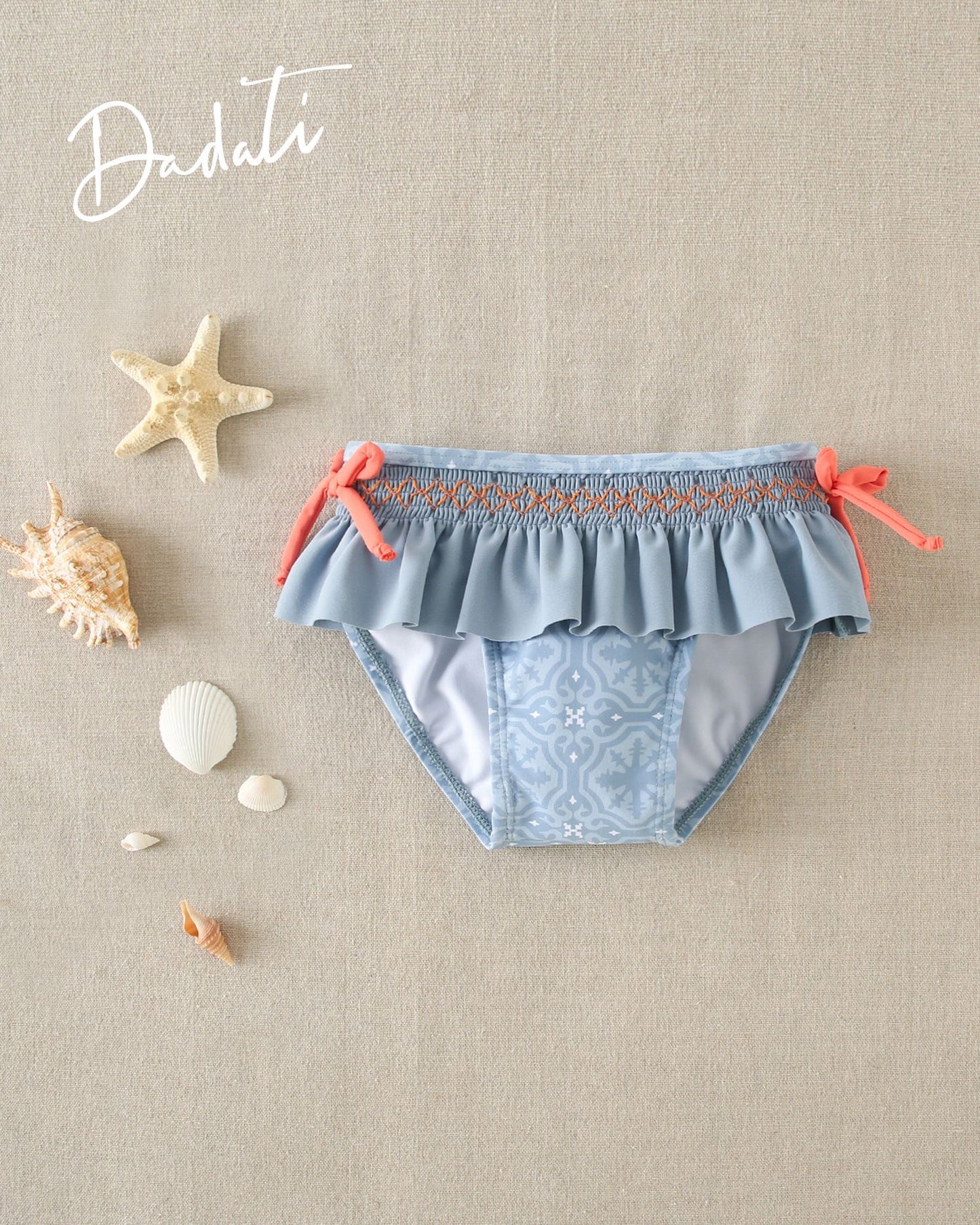 CULETÍN DE BEBÉ CON ESTAMPADO GEOMÉTRICO CON DETALLE DE LAZOS