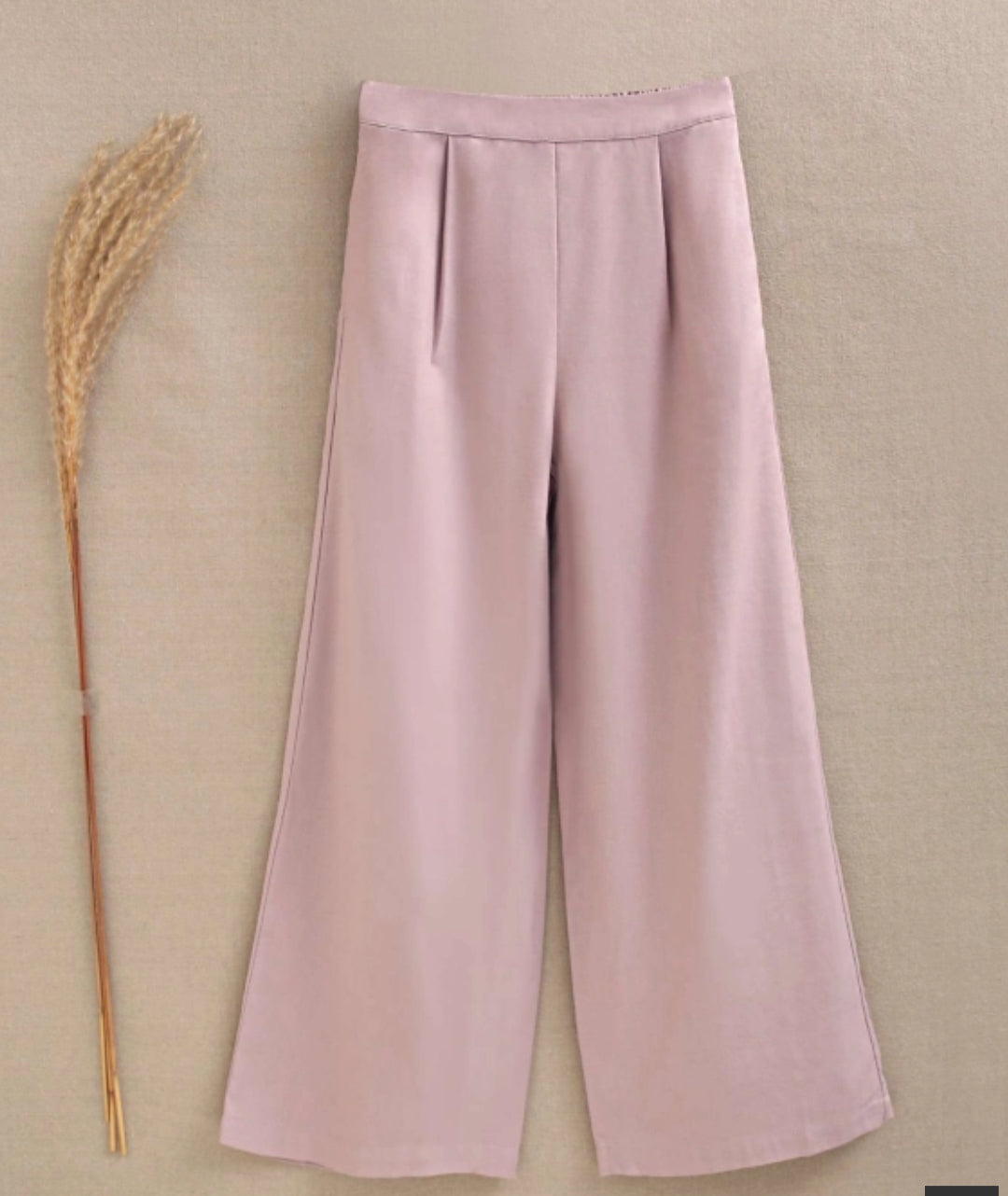 PANTALÓN DE NIÑA MALVA FLUIDO CON TEXTURA