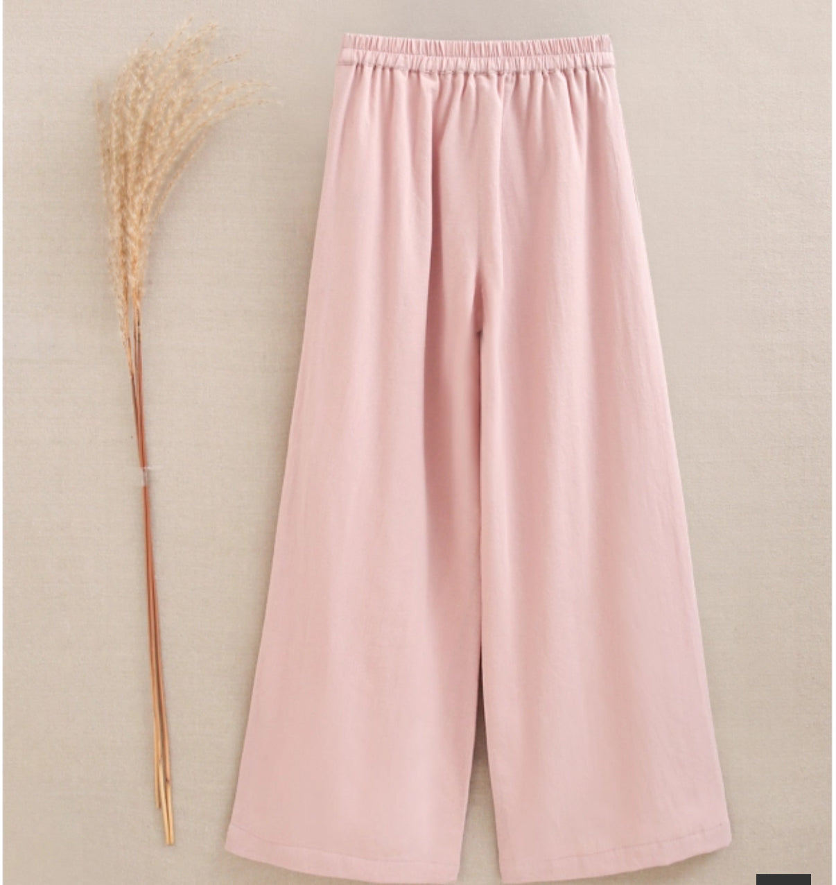 PANTALÓN DE NIÑA ROSA FLUIDO CON TEXTURA